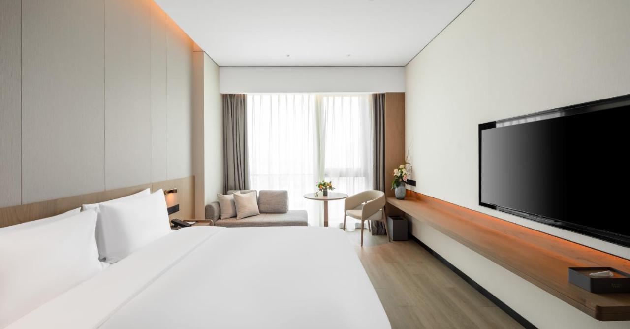 The Coli Hotel Цзинань Экстерьер фото